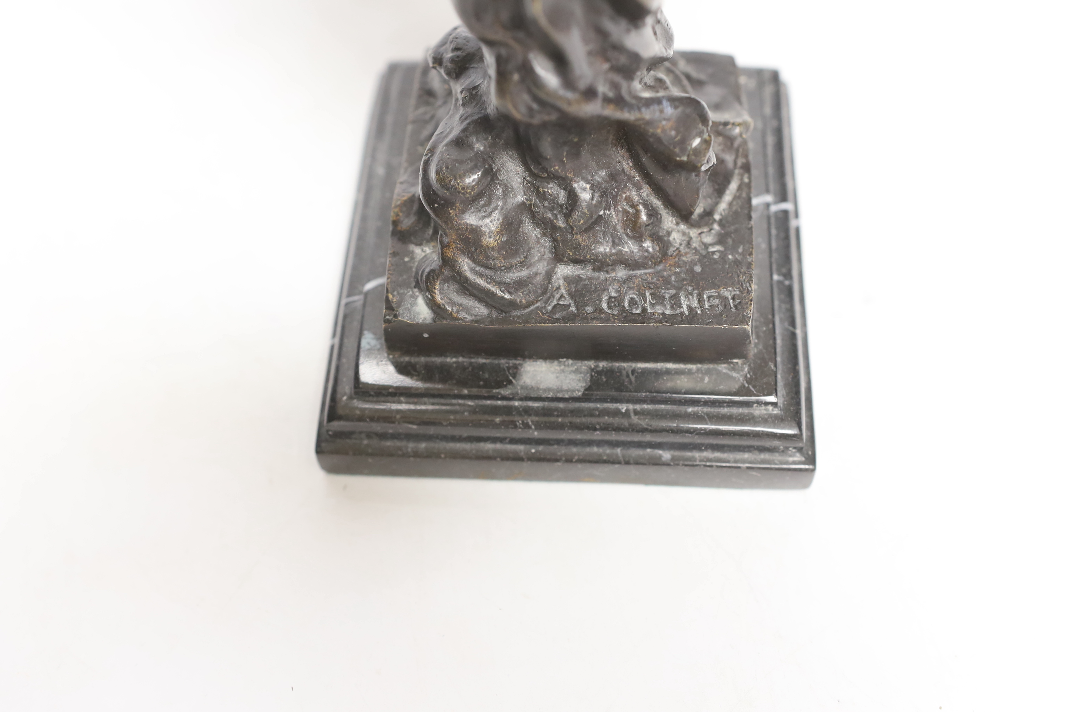 After Claire Colinet (1885-1972), a bronze study of a Pierrot and crescent moon, raised on stepped marble base, 33cm high